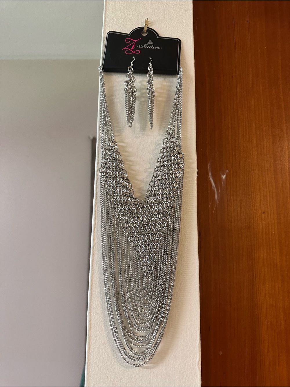 Silver tone necklace and earrings set